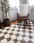 Atira Brown Checkered Area Rug