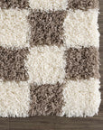 Atira Brown Checkered Area Rug