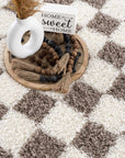 Atira Brown Checkered Area Rug