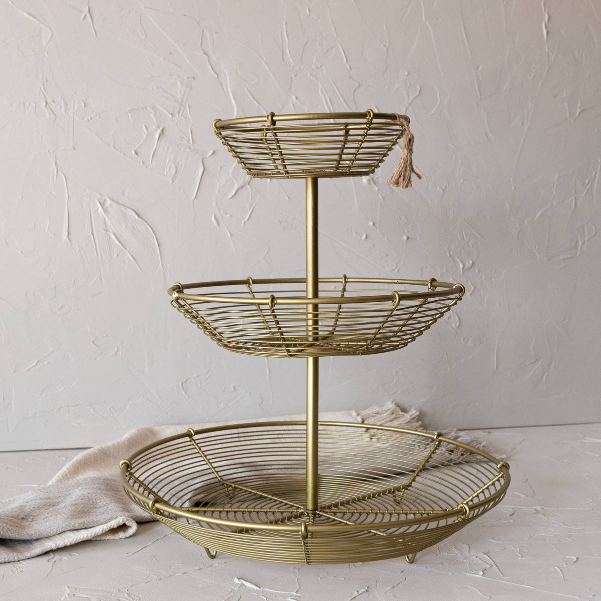 Auden 3-Tiered Brass Basket Riser Metal with Jute Tassel