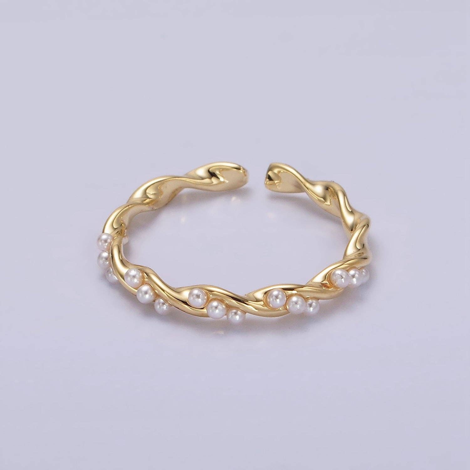 14K Gold Pearl Lined Twisted Ring