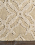 Fyffe Embossed Beige Wool Area Rug