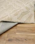 Fyffe Embossed Beige Wool Area Rug