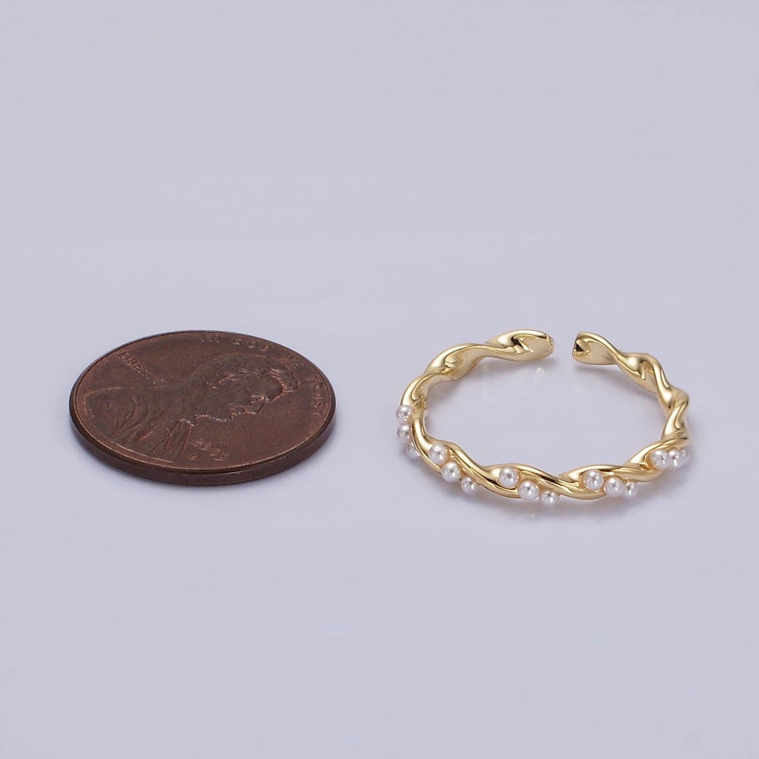 14K Gold Pearl Lined Twisted Ring