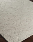 Fyffe Embossed Beige Wool Area Rug